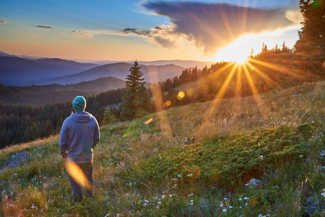 Hiker on the Thompson Divide at Sunset